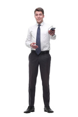 friendly young businessman with smartphone. isolated on white