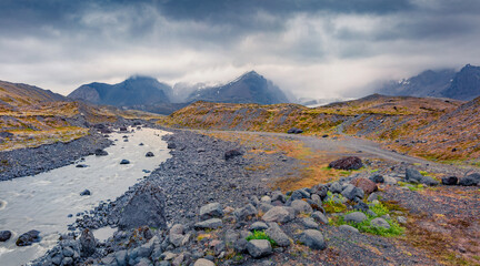 Melting ice from Vatnajokull glacier. Gloomy summer view of Vatnajokull National Park, Iceland, Europe. Beauty of nature concept background.