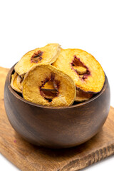 Dried peach slices. Sliced dry peach isolated on white background. Sun-dried fruit. Close up