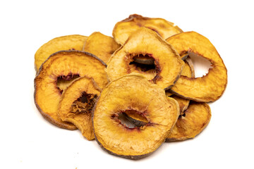 Dried peach slices. Sliced dry peach isolated on white background. Sun-dried fruit. Close up