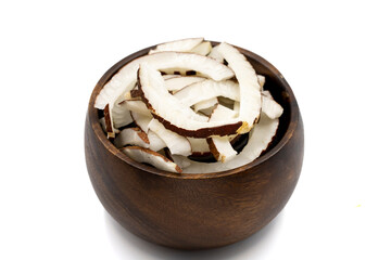 Dried coconut slices. Sliced dry coconut isolated on a white background. Sun-dried fruit. close up