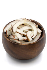 Dried coconut slices. Sliced dry coconut isolated on a white background. Sun-dried fruit. close up