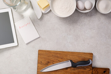 Notebook with recipes and products for cooking.