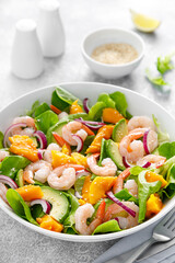 Shrimp, avocado and mango salad with fresh green lettuce. Prawn salad