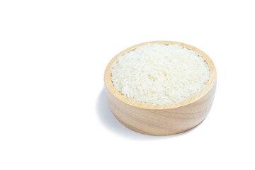 Thai jasmine rice in wooden cup on white background.
