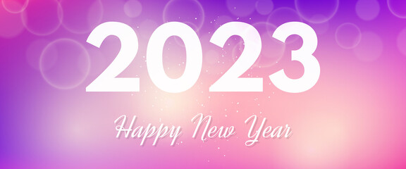 Happy new year 2023 incription on blurred background