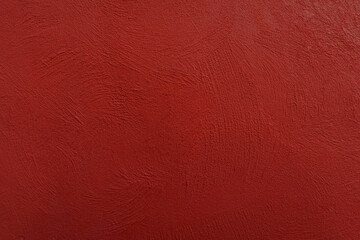 Fototapeta premium Crimson colored wall background with textures of different shades of crimson red