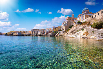 The emerald sea at the Vaporia district, city of Ermoupoli at Syros island, Cyclades, Greece,...