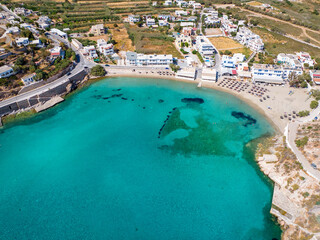 Fototapeta na wymiar Aerial view of the beautiful beach at Vari, Syros island, Greece, with turquoise sea and fine sand