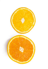 fresh orange fruit slices over on white background.top view