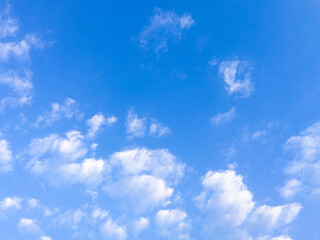 Naklejka na ściany i meble white clouds on bright blue sky backgrounds. edit in Lightroom Classic