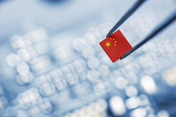 Flag of China on a processor, CPU Central processing Unit or GPU microchip on a motherboard. China...