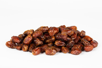 Heap of pitted dates isolated on white background