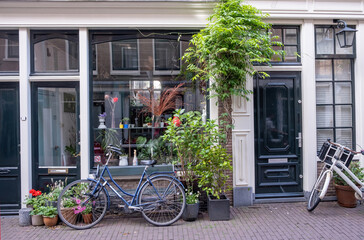 Holland Netherlands, bicycle parked in front of a building, Amsterdam city neighborhood.