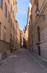 Fototapeta na wymiar Narrow streets in the old town Gamla Stan a sunny summer day in Stockholm