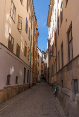 Fototapeta na wymiar Narrow streets in the old town Gamla Stan a sunny summer day in Stockholm