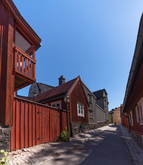 Old wood houses in the block Djurgårdsstaden at the street Breda Gatan in the island Djurgården a...