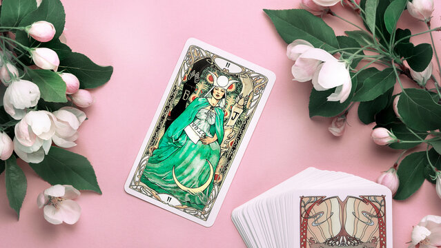 Blurred Tarot cards layout on witch table. Esoteric concept and astrology