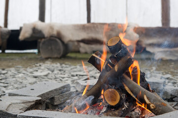Bonfire Inside a Tipi Tent in Norway, with a Bonfire © goyoconde