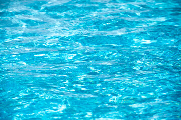 Water in swimming pool, background with high resolution. Wave abstract or rippled water texture.