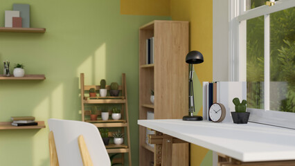 Comfortable home working room interior design with working table against the window