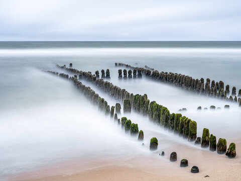 Wooden groyne at the North Sea coast near Rantum, Sylt, Schleswig-Holstein, Germany
