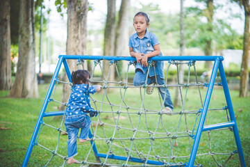 The girls enjoyed playing and climbing in the playground.