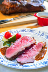 A Plate Of Roast Beef With Mixed Vegetables	