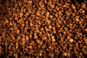 Close-up photo of buckwheat grains. Macro, texture.