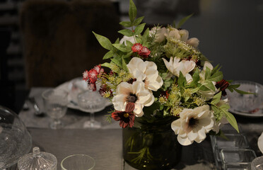 Beautiful vase of flowers on the dining table