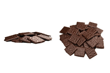 Dark chocolate candies isolated on white background.