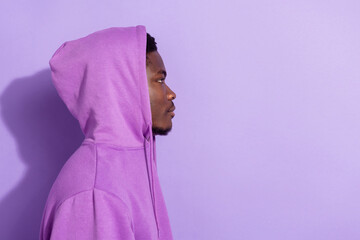 Profile side view portrait of attractive guy wearing cozy clothes copy space isolated over bright...
