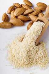 almond flour on a white acrylic background