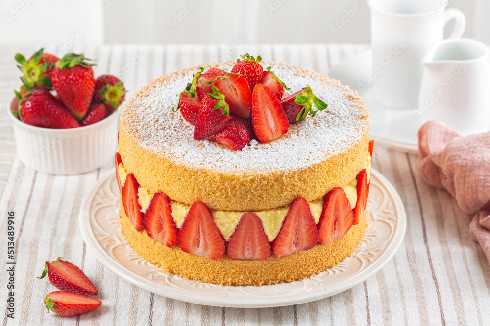 Sticker homemade french fraisier cake made with two layer of genoise sponge, diplomat cream and fresh strawb