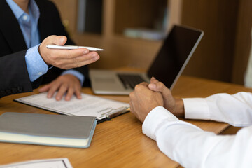 Lawyers are advising clients and discussing contracts, legal agreements.