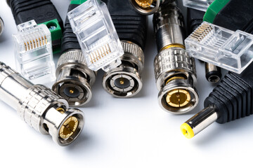 Various connectors for coaxial and twisted pair cable, for video signal transmission.