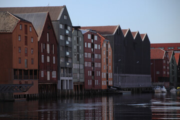 Naklejka premium Scenic View Of Lake By Buildings Against Sky, Trondheim, Norway