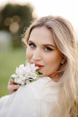 Fototapeta premium portrait of a woman with flowers