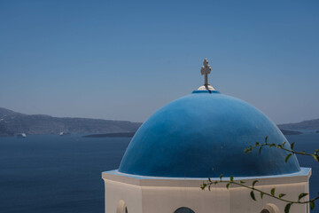 Fototapeta na wymiar Greece, Cyclades Islands, Santorini, Oia, Church with bell tower at coast 