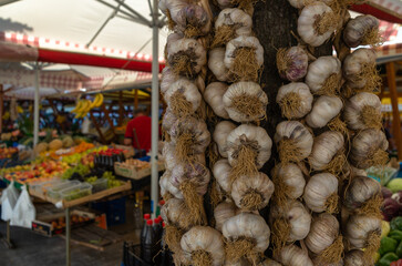 Strings of Garlic at the Market