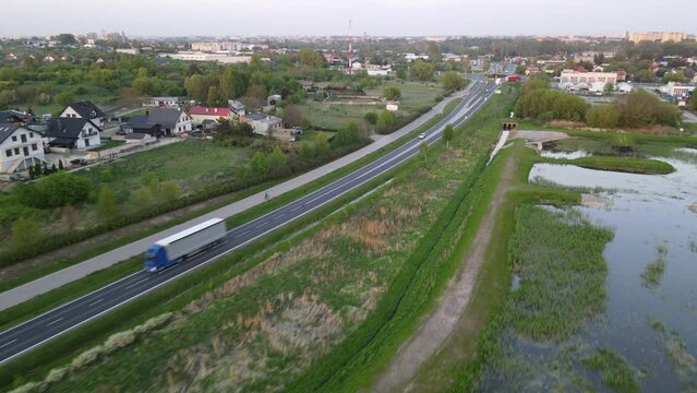 Aerial shot of the traffic on an asphalt highway in the suburbs of Radom, Poland
