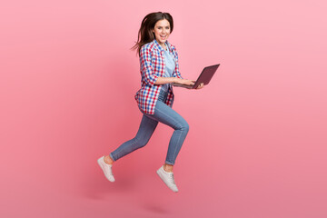 Full body photo of charming beautiful businesswoman analyze information isolated on pink color background