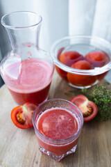 Freshly made and homemade red tomato juice. Tomato-based healthy breakfast or drink