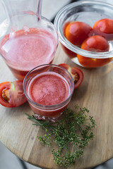Freshly made and homemade red tomato juice. Tomato-based healthy breakfast or drink