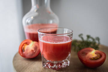Freshly made and homemade red tomato juice. Tomato-based healthy breakfast or drink