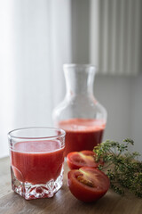Freshly made and homemade red tomato juice. Tomato-based healthy breakfast or drink