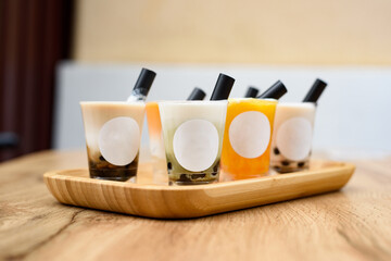 Butterfly pea milk bubble tea with tapioca pearls. Place for a logo