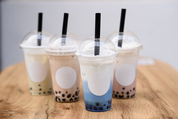 Butterfly pea milk bubble tea with tapioca pearls. Place for a logo