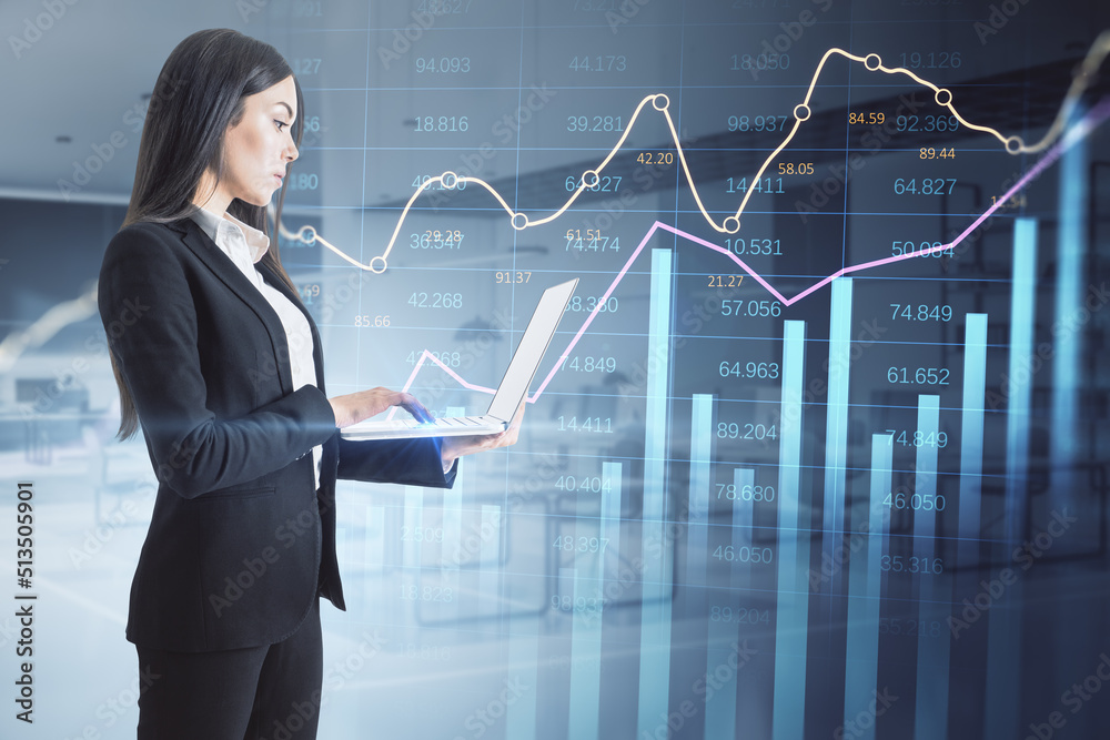 Poster businesswoman using laptop with abstract glowing business chart with index and growth on blurry offi