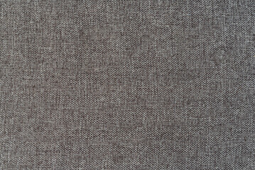 Fototapeta na wymiar close-up of rough linen fabric, full frame cloth background
